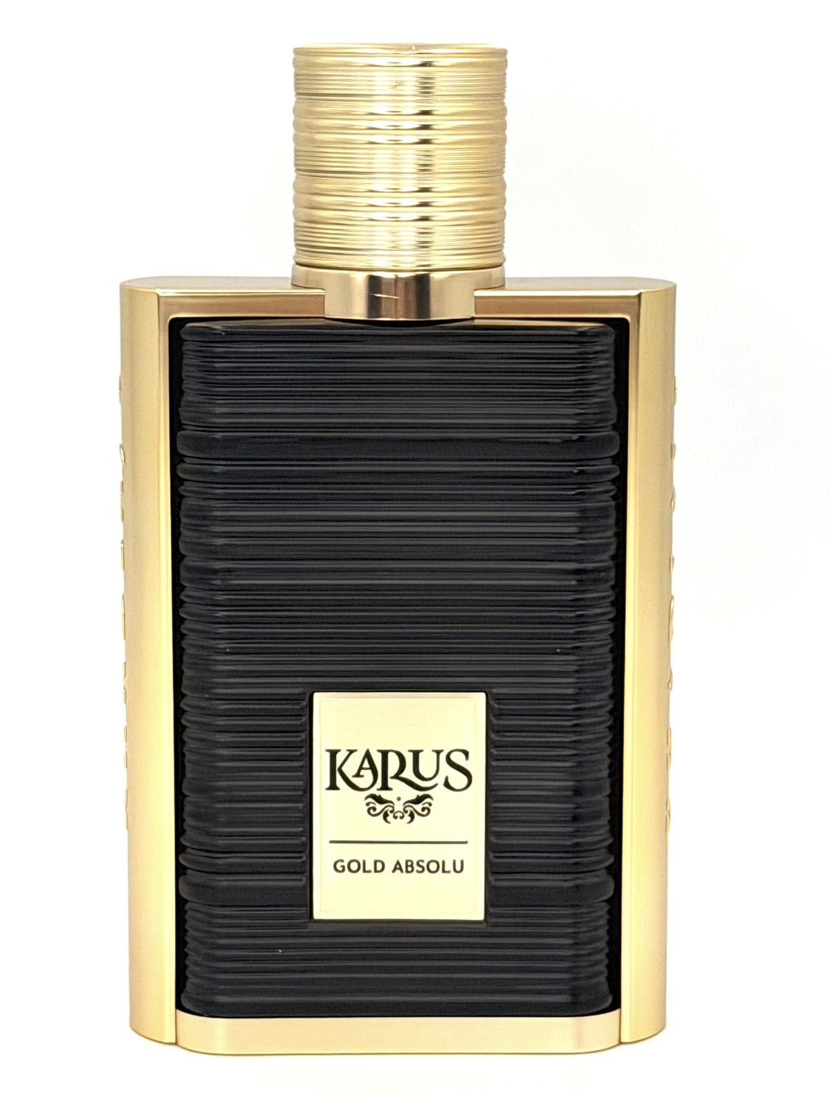 A bottle of Karius Gold Absolu fragrance with a textured black front and gold metallic sides and cap, set against a plain white background.